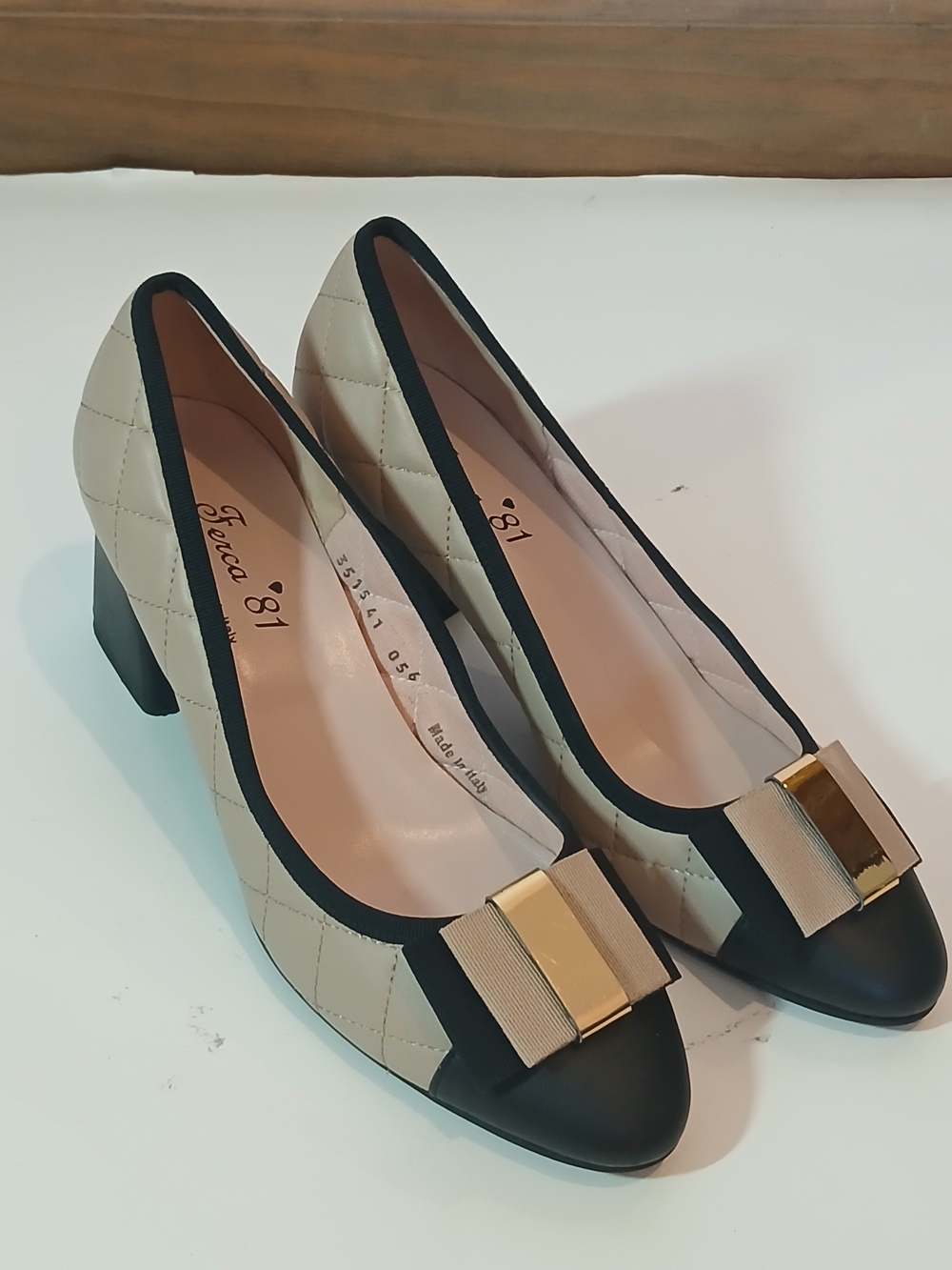 Two-Tone Cream and Black Quilted Block Heel Pumps with Bow